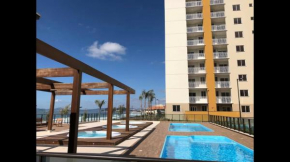 Resort em Barra Velha, Pé na areia Apartamento com vista pro mar